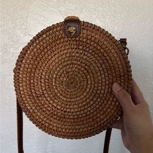 Round Woven Crossbody Bag in Brown
